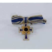 Miniatur Mutterkreuz in Gold an Schleife