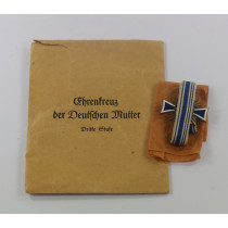 Mutterkreuz in Bronze, in Verleihungstüte Lock & Hanenberger, Oberstein / Nahe Variante (!)