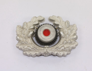  Wehrmacht Heer, Schirmmützeneichenlaub und Korkade für Offiziere - Militaria-Berlin
