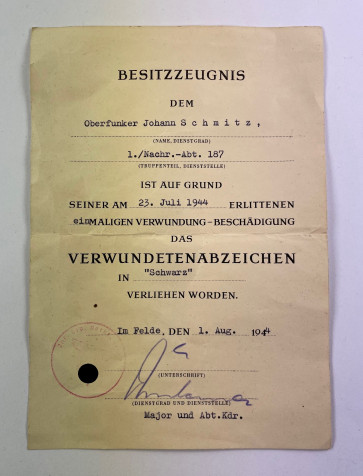 Besitzzeugnis Verwundetenabzeichen in Schwarz 1939, Nachrichten-Abteilung 187 - Militaria-Berlin