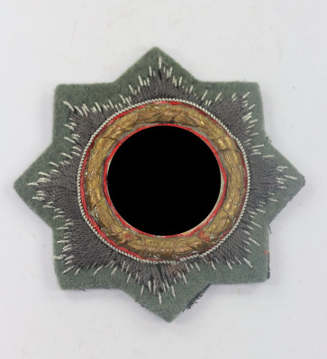 Deutsches Kreuz in Gold auf Heeresstoff - Militaria-Berlin