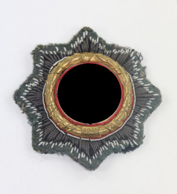 Deutsches Kreuz in Gold auf Heeresstoff, Hst. HS (Hermann Schmuck & Cie., Weißenburg) - Militaria-Berlin