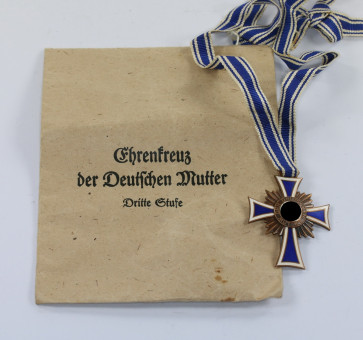 Mutterkreuz in Bronze, in Verleihungstüte Frank & Reif Stuttgart - Militaria-Berlin