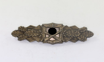  Nahkampfspange in Bronze, Hst. FLL 1. Modell (!) - Militaria-Berlin
