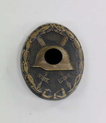 Verwundetenabzeichen in Schwarz 1939, Kriegsgefangenschaft, Hst. L/11 (Wilhelm Deumer, Lüdenscheid) - Militaria-Berlin