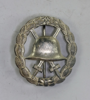 Verwundetenabzeichen in Silber 1918, durchnbrochen (Buntmetall) - Militaria-Berlin
