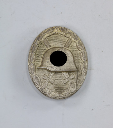 Verwundetenabzeichen in Silber, Hst. L55 und 100 - Militaria-Berlin