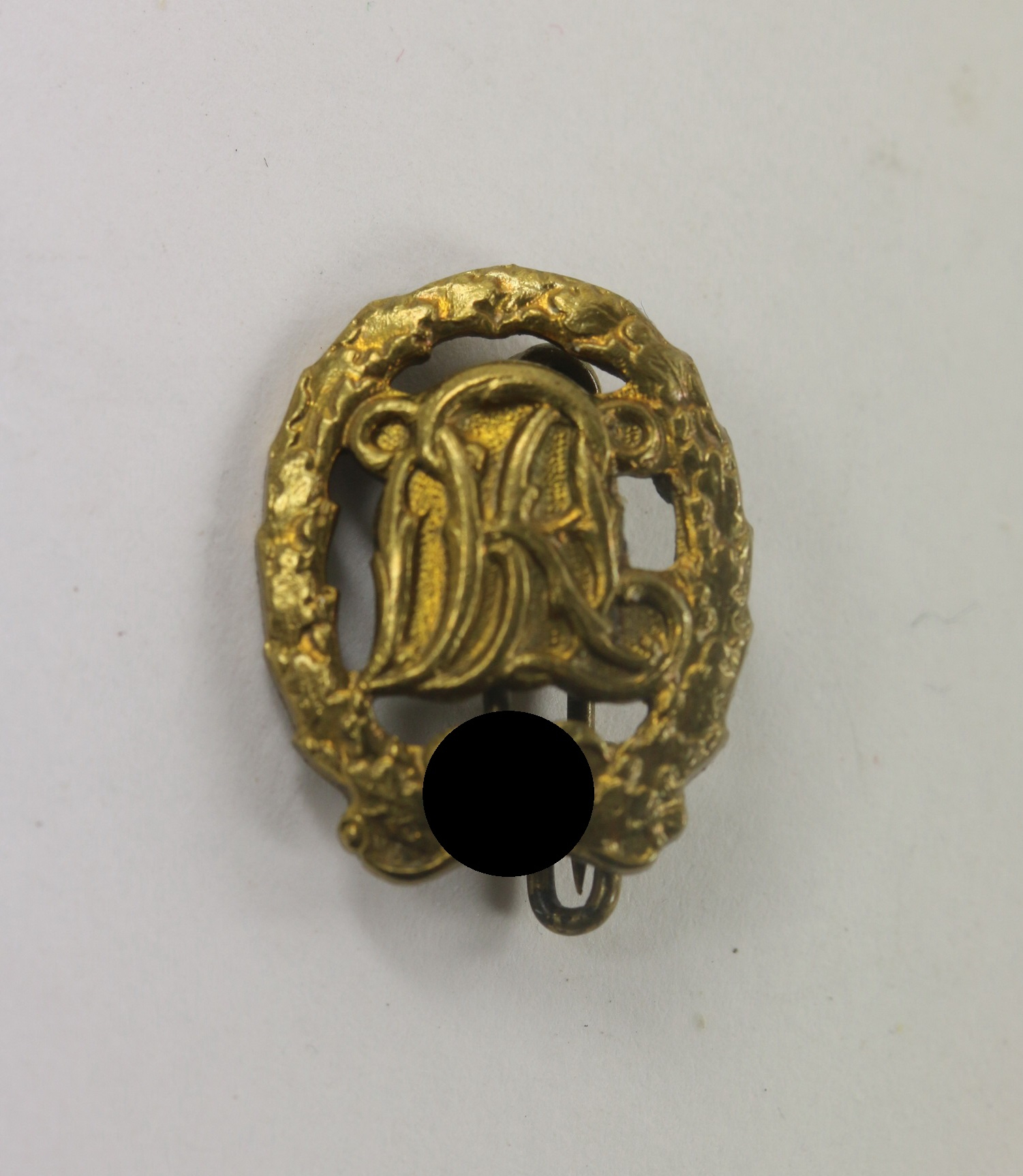  16 MM Miniatur Reichssportabzeichen in Gold, Hst. E.L.M. – Bild 1