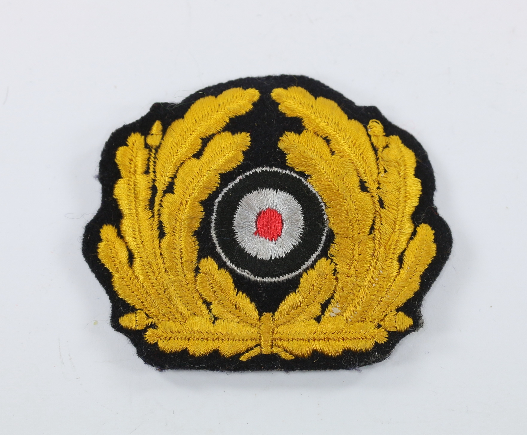 kriegsmarine_eichenlaub_f_r_schirmm_tzen_der_offiziere_1_ Kriegsmarine, Eichenlaubkranz mit Korkade für Offiziere – Bild 1