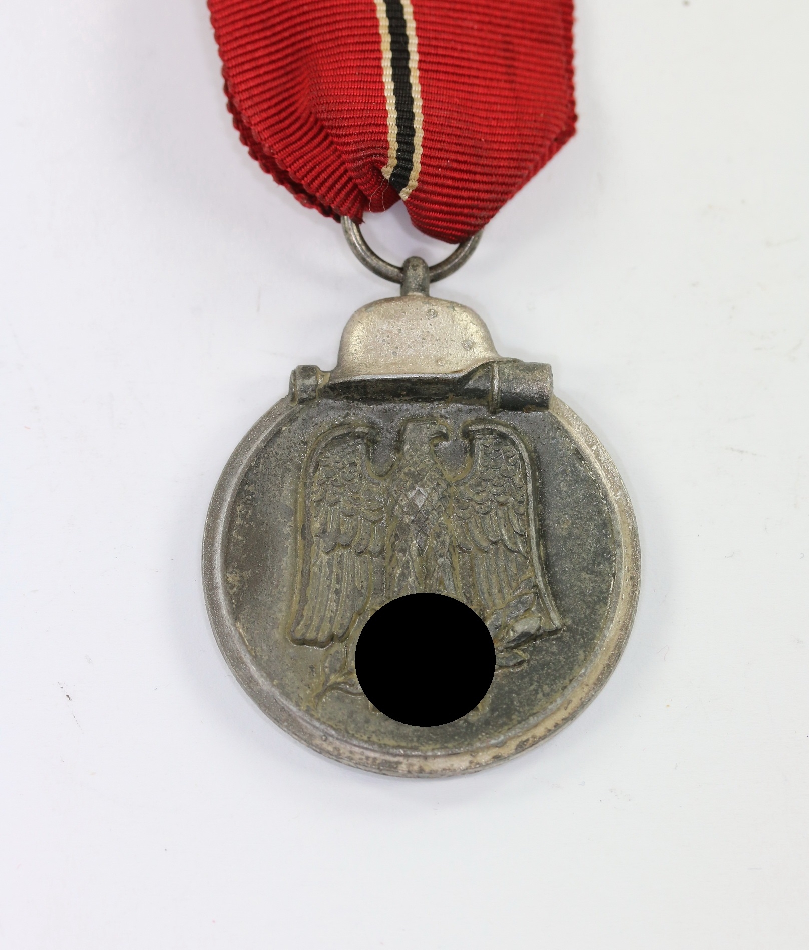 ostmedaille_hst Ostmedaille, Hst. 55, Winterschlacht im Osten 1941/42 – Bild 1