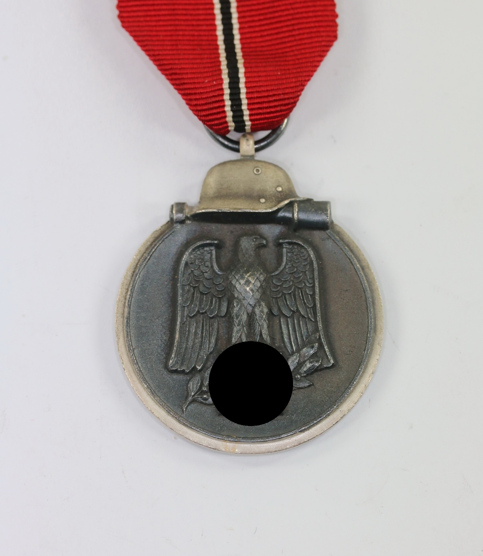 ostmedaille_hst Ostmedaille, Hst. 55, Winterschlacht im Osten 1941/42 – Bild 1