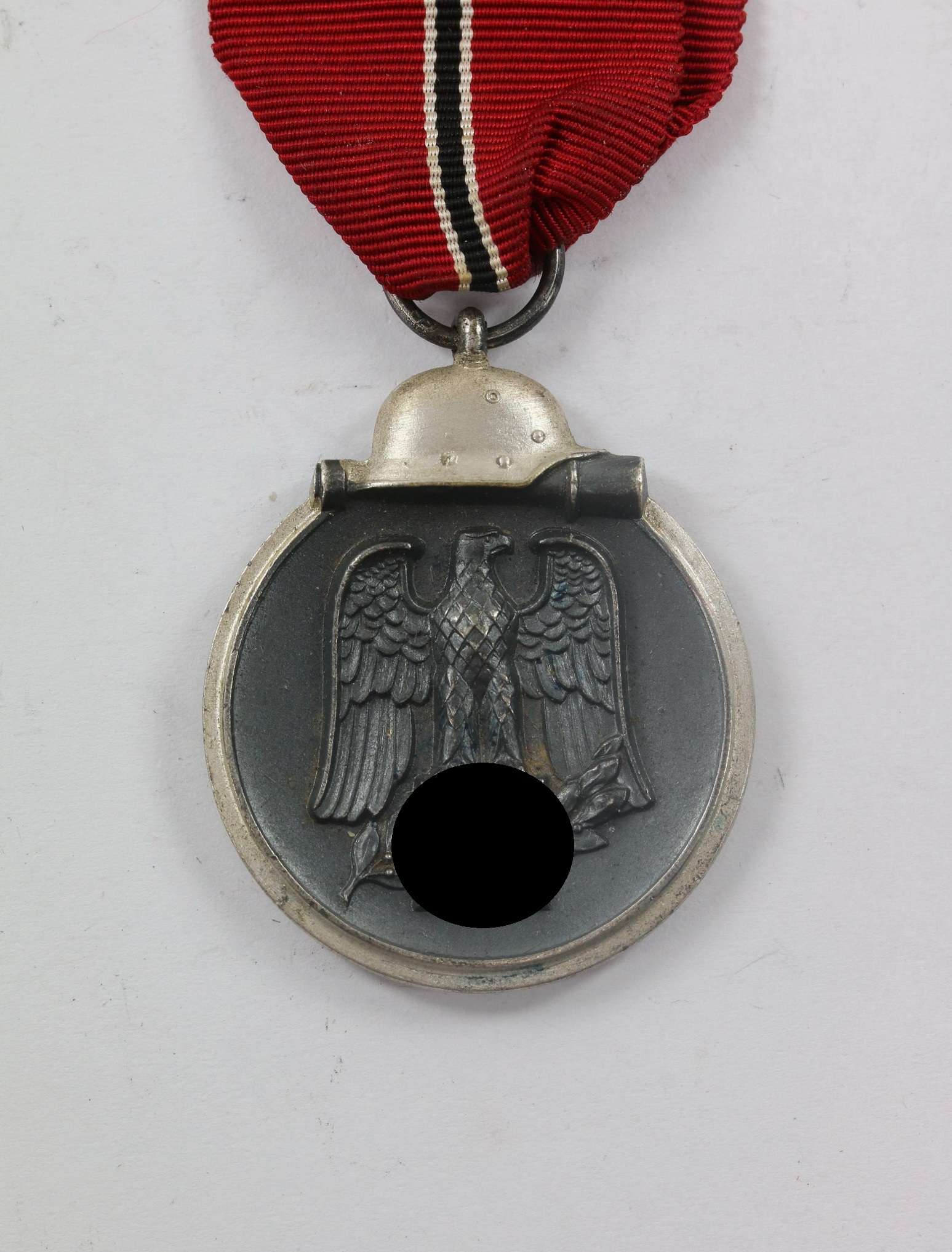 ostmedaille_hst Ostmedaille, Hst. 55, Winterschlacht im Osten 1941/42 – Bild 1