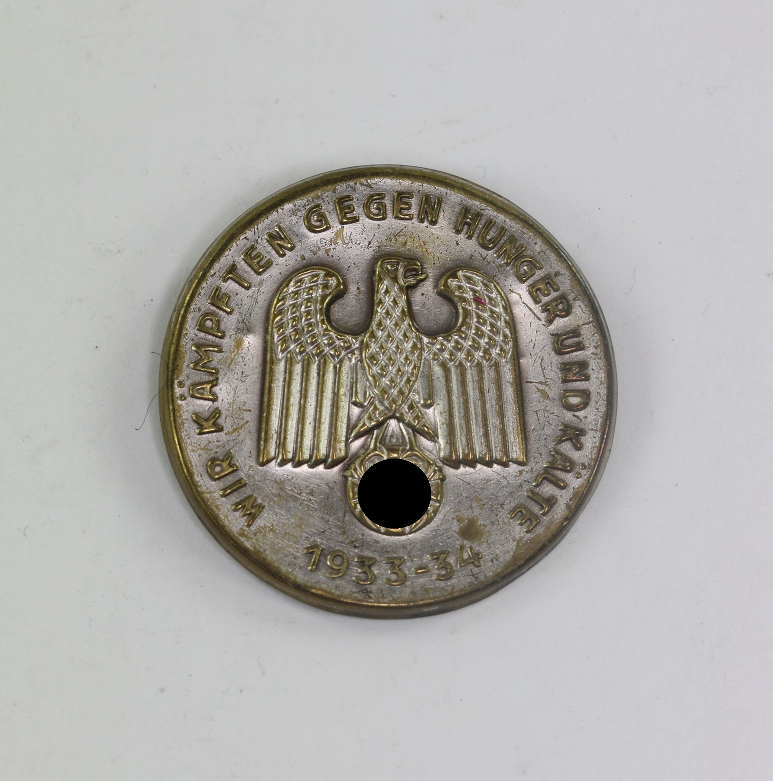 Abzeichen, Wir kämpfen gegen Hunger und Kälte1933 - 34 – Bild 1