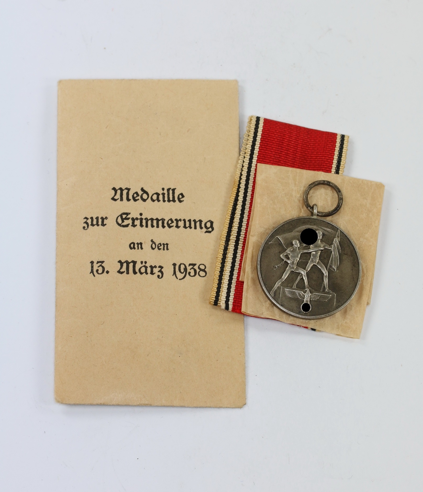 Anschlußmedaille Österreich (13. März 1938), in Verleihungstüte Hauptmünzamt Wien – Bild 1