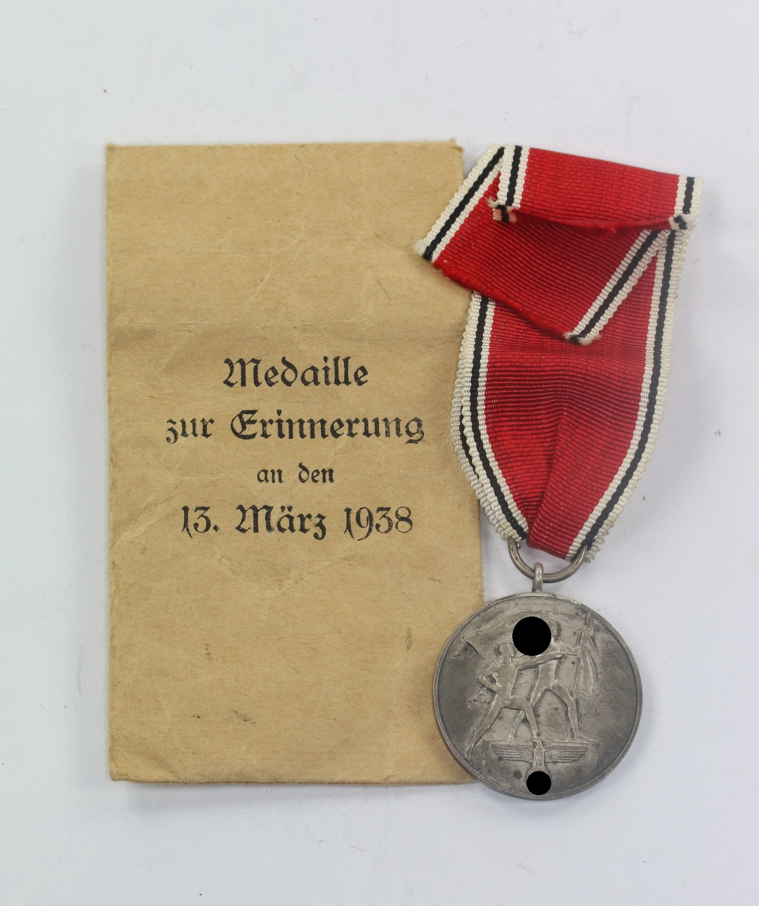 Anschlußmedaille Österreich (13. März 1938), in Verleihungstüte Hauptmünzamt Wien – Bild 1