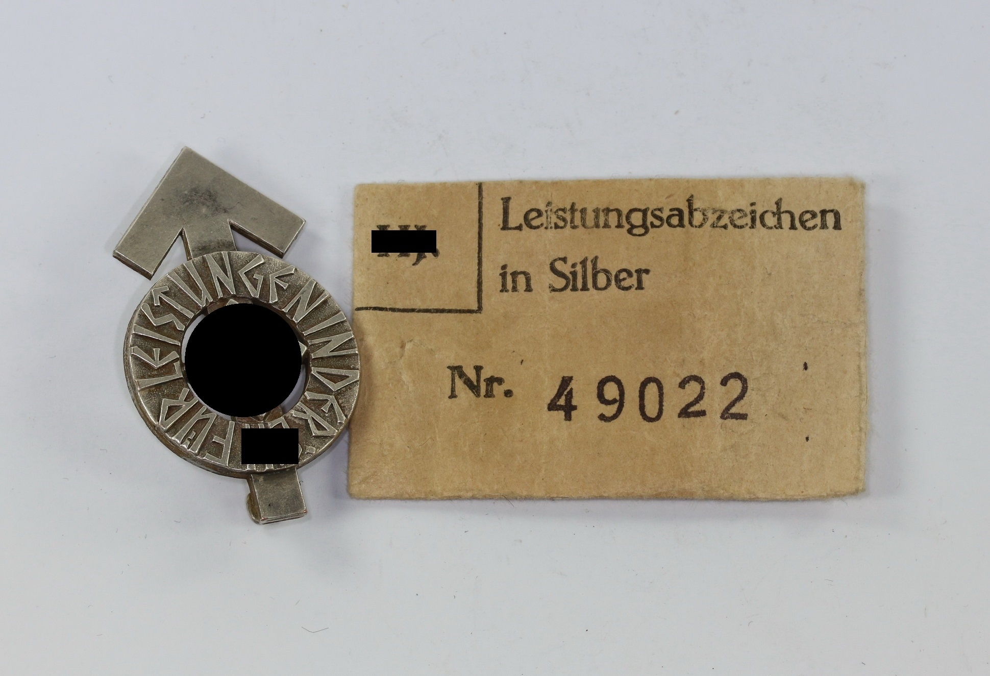 Hitlerjugend (HJ), Leistungsabzeichen in Silber, Hst. RZM M1/34, in nummerngleicher Verleihungstüte  – Bild 1