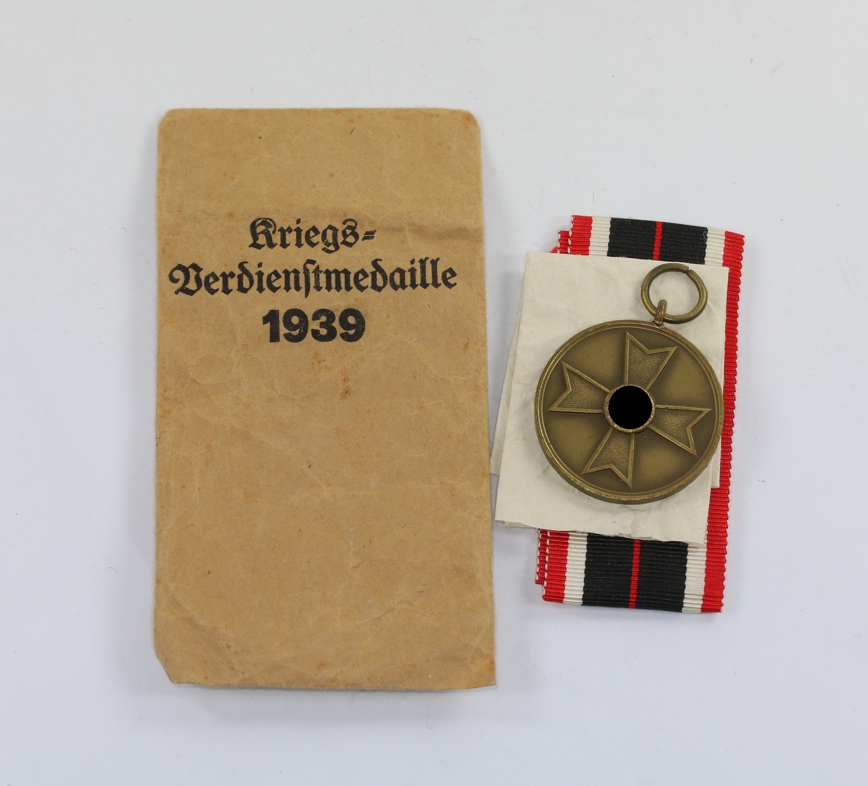 kriegsverdienstmedaille_in_verleihungst_te_berg_nolte_1__1 Kriegsverdienstmedaille, in Verleihungstüte, Berg & Nolte – Bild 1