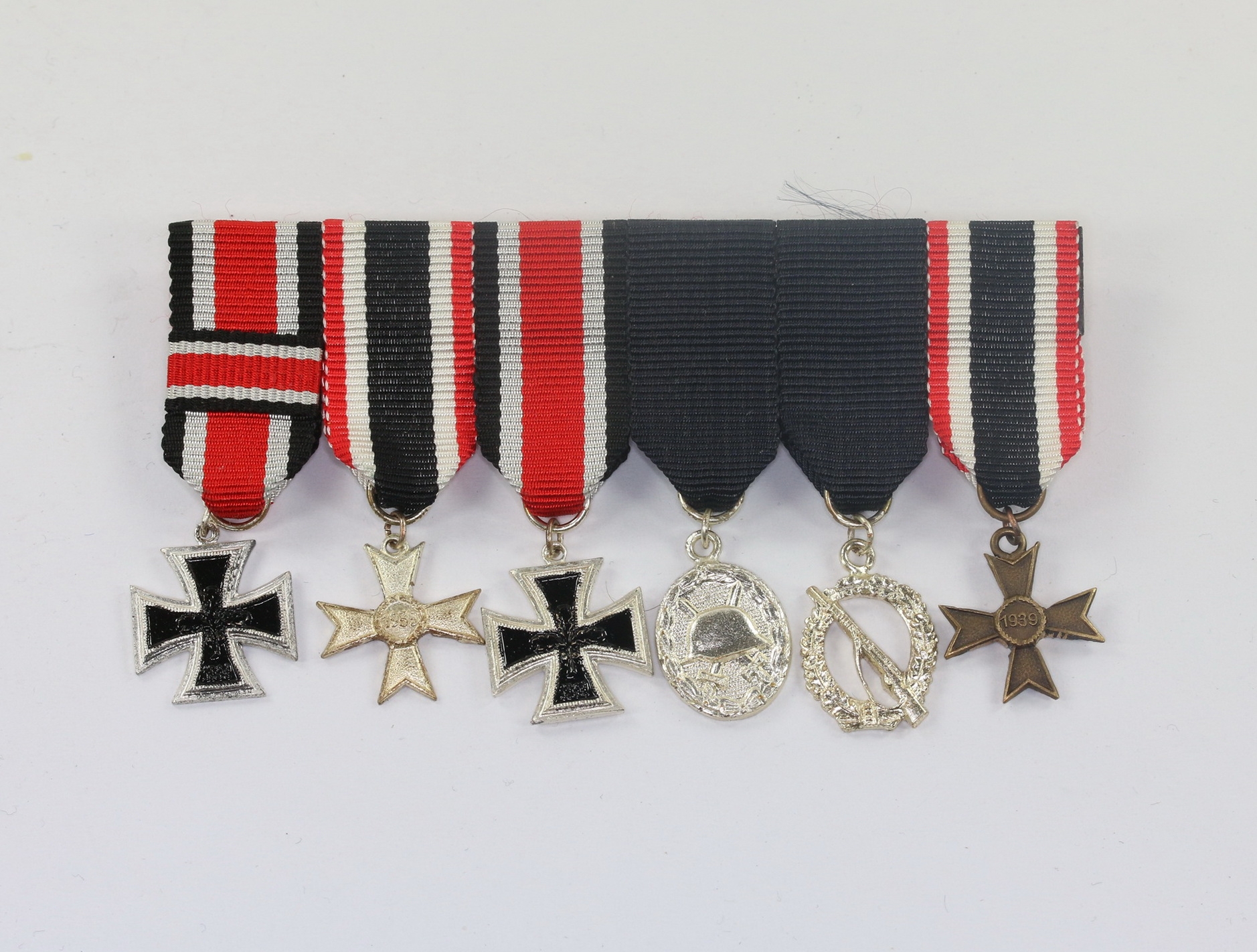 miniatur_ordensschnalle_6_x_1957_1_ Miniatur Ordensschnalle 6 X, 1957 – Bild 1