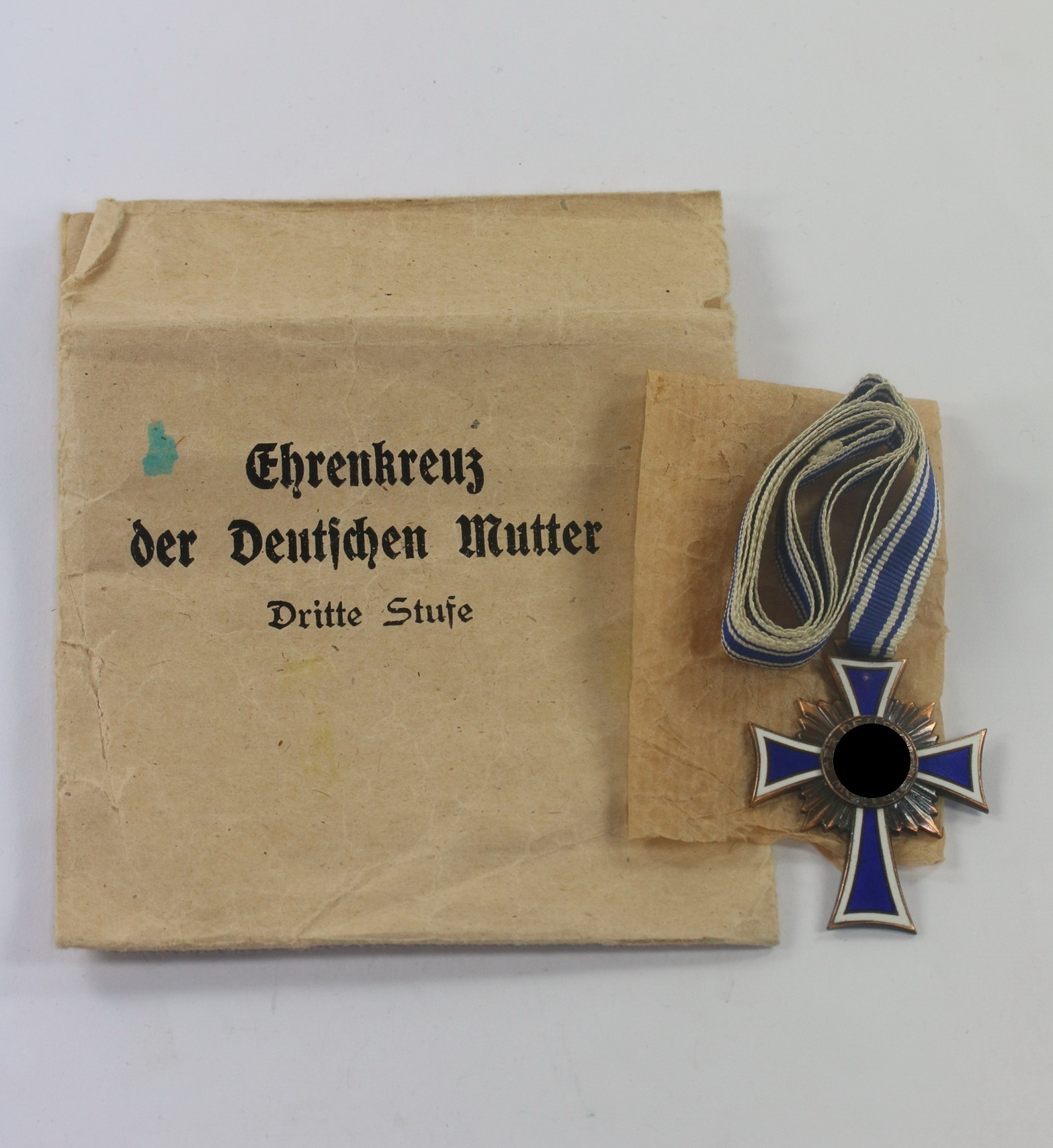 mutterkreuz_in_bronze_in_verleihungst_te_f Mutterkreuz in Bronze, in Verleihungstüte F.W. Assmann & Söhne Lüdenscheid – Bild 1