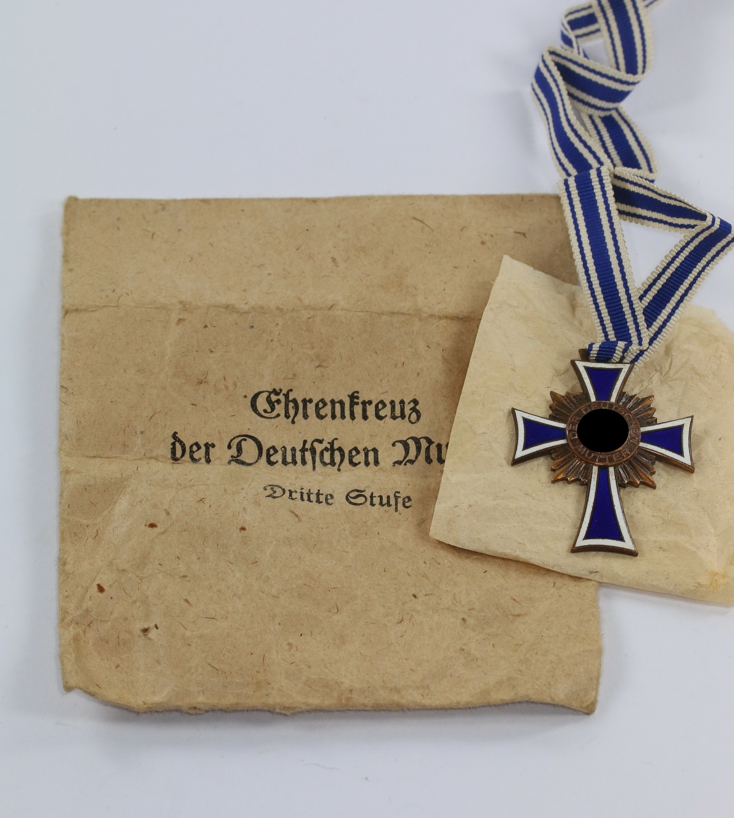 mutterkreuz_in_bronze_in_verleihungst_te_g Mutterkreuz in Bronze, in Verleihungstüte, G. Wagner jr. Oberstein – Bild 1