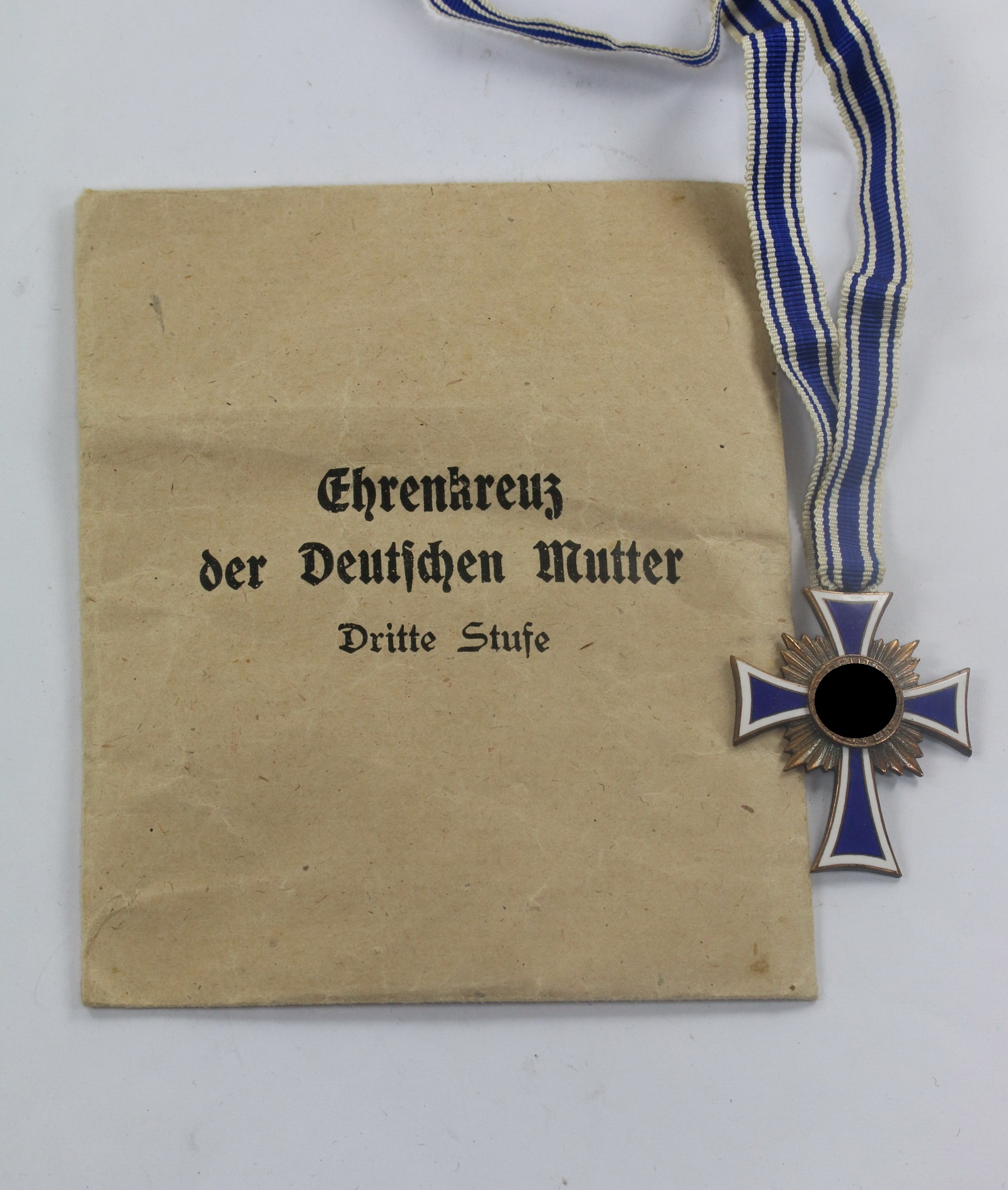 mutterkreuz_in_bronze_in_verleihungst_te_wilh Mutterkreuz in Bronze, in Verleihungstüte Wilh. Schröder & Co. Lüdenscheid – Bild 1