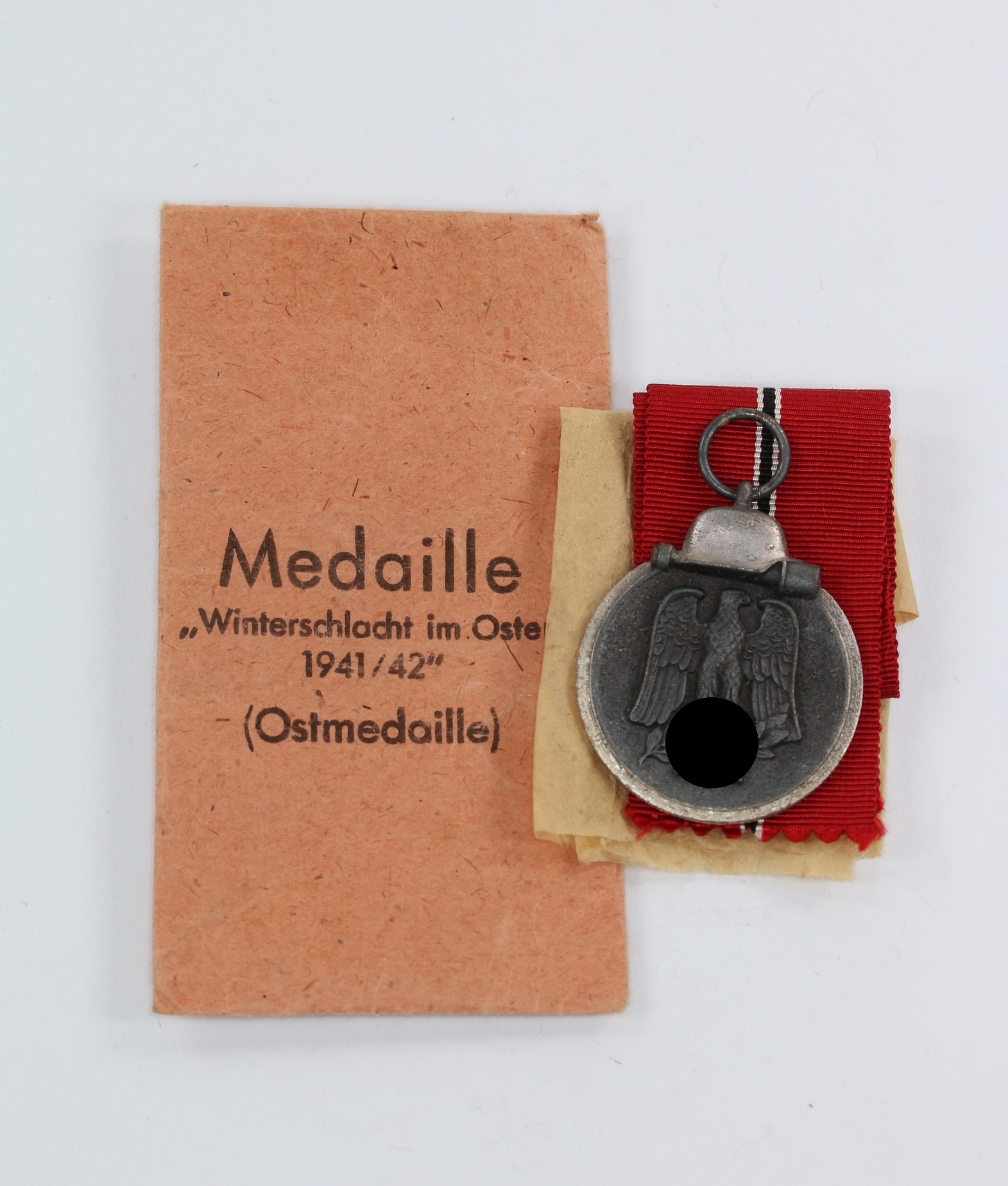 ostmedaille_hst Ostmedaille, Hst. 19, in Verleihungstüte – Bild 1