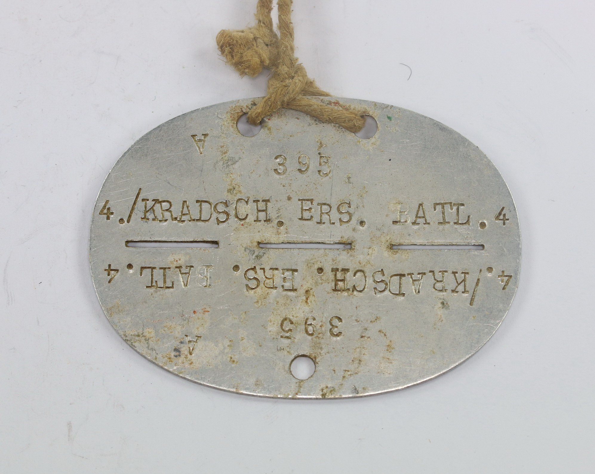 Wehrmacht Heer, Erkennungsmarke Kratschützen Ersatz Bataillion 4 (Kradsch. Ers. Batl. 4) – Bild 1