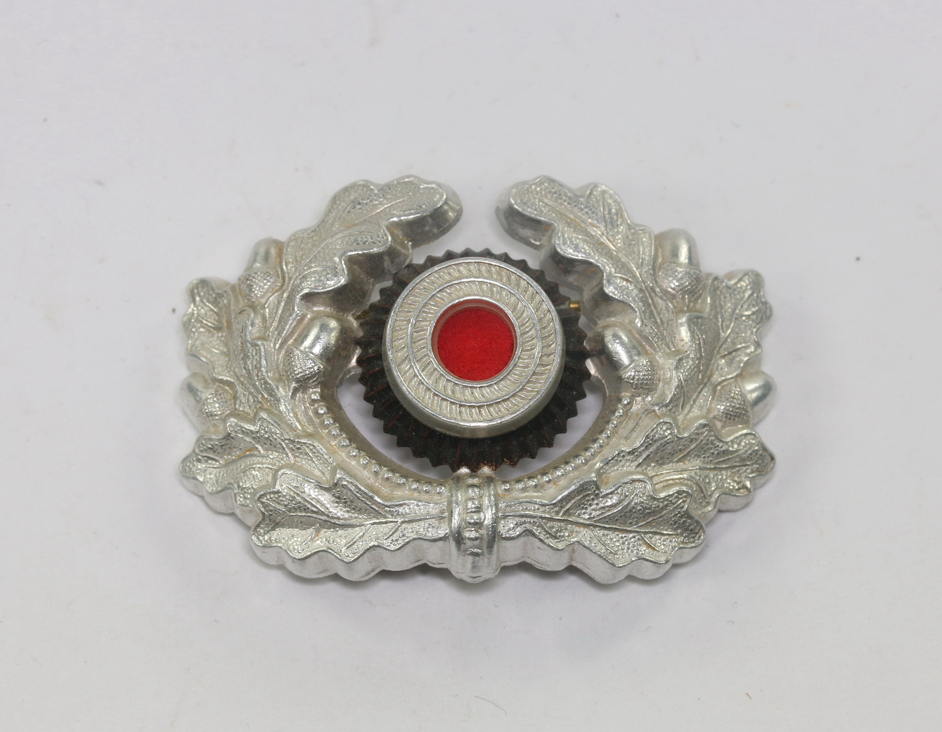 Wehrmacht Heer, Kokarde mit Eichenlaub für die Schirmmütze – Bild 1