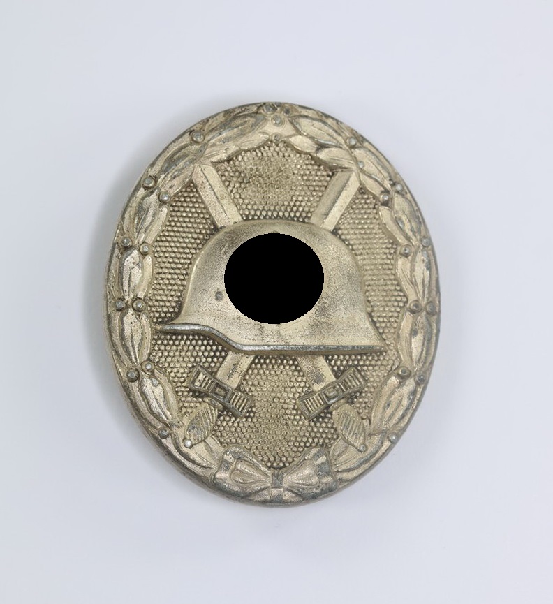 Verwundetenabzeichen in Silber 1939, Hersteller Markierung 65 (Klein & Quenzer A.G., Oberstein) (1) Verwundetenabzeichen in Silber 1939, Hersteller Markierung 65 (Klein & Quenzer A.G., Oberstein) – Bild 1