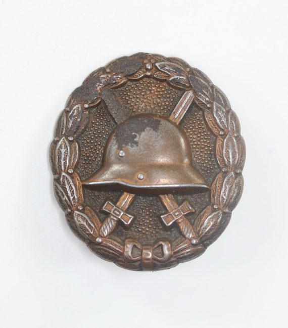 verwundetenabzeichen_in_schwarz_1918_an_schraube_und_scheibe_d